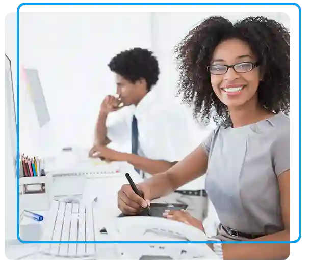 smiling woman at work station